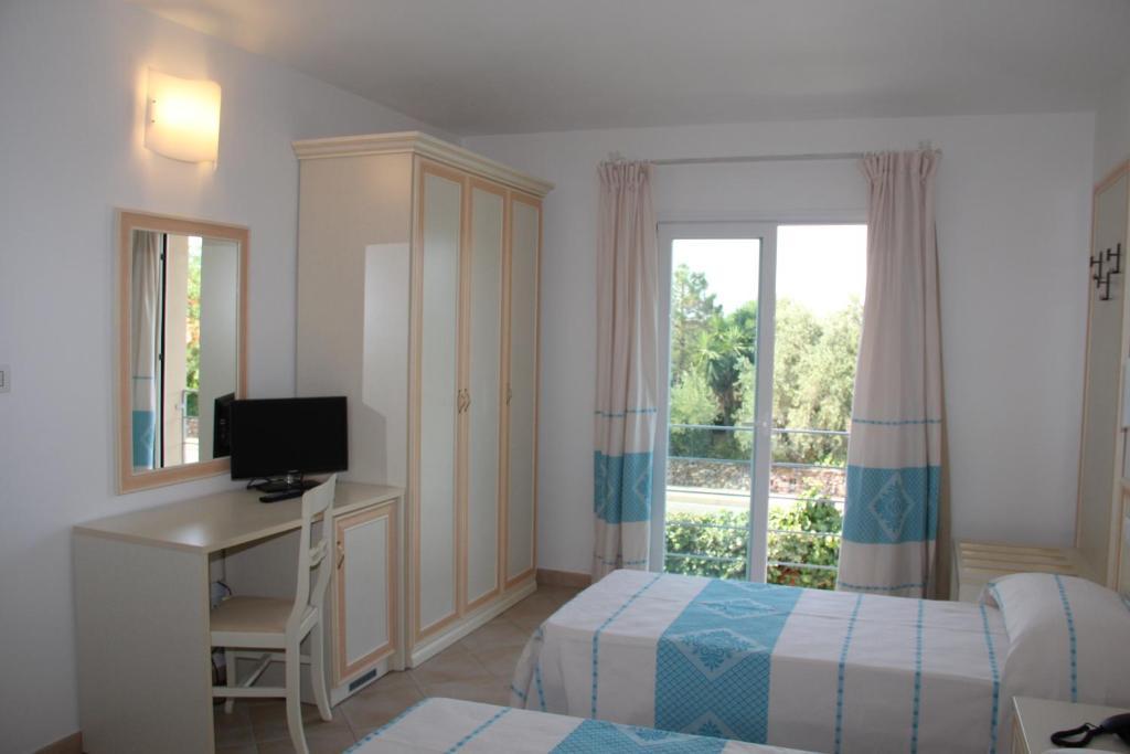 Hotel Stella Marina Сан-Теодоро Номер фото